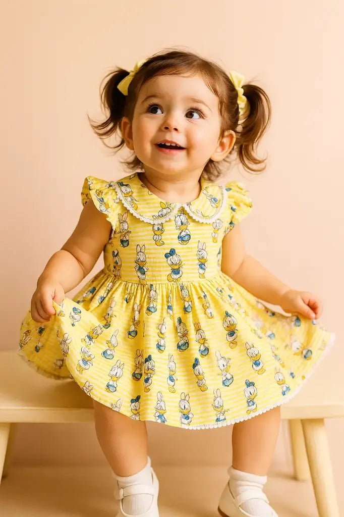 yellow cartoon print cotton frock for girls – donald & daisy duck design