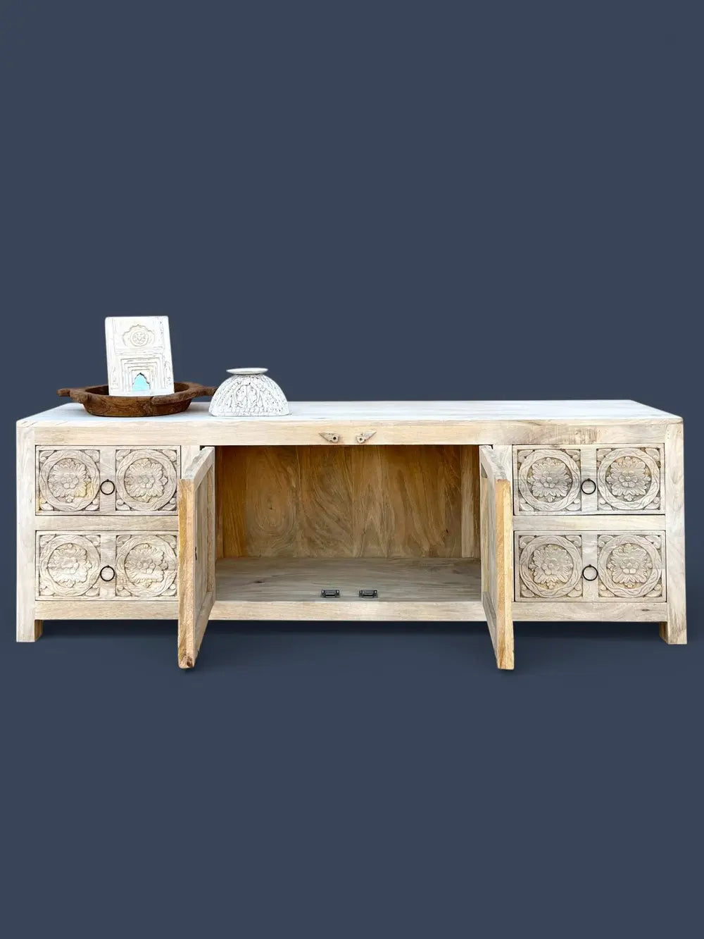 hand carved wooden tv cabinet in bleach finish