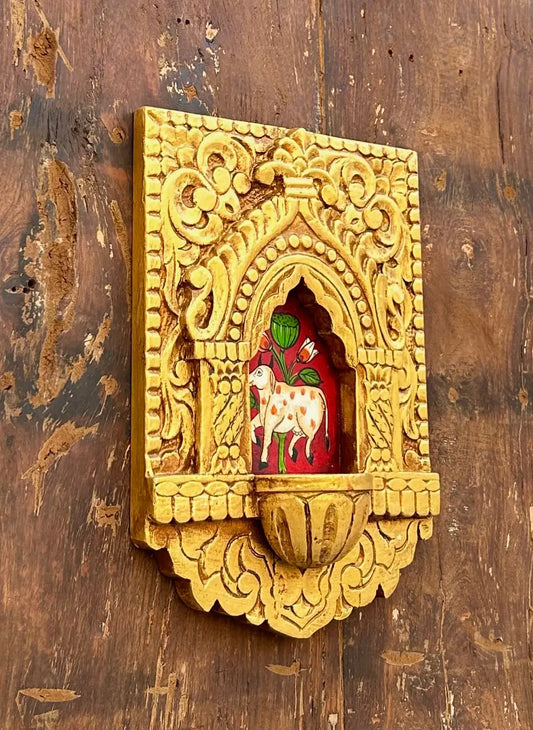 Hand-Carved Wooden Jharokha Wall Frame with Mini Shelf – Traditional Cow Motif