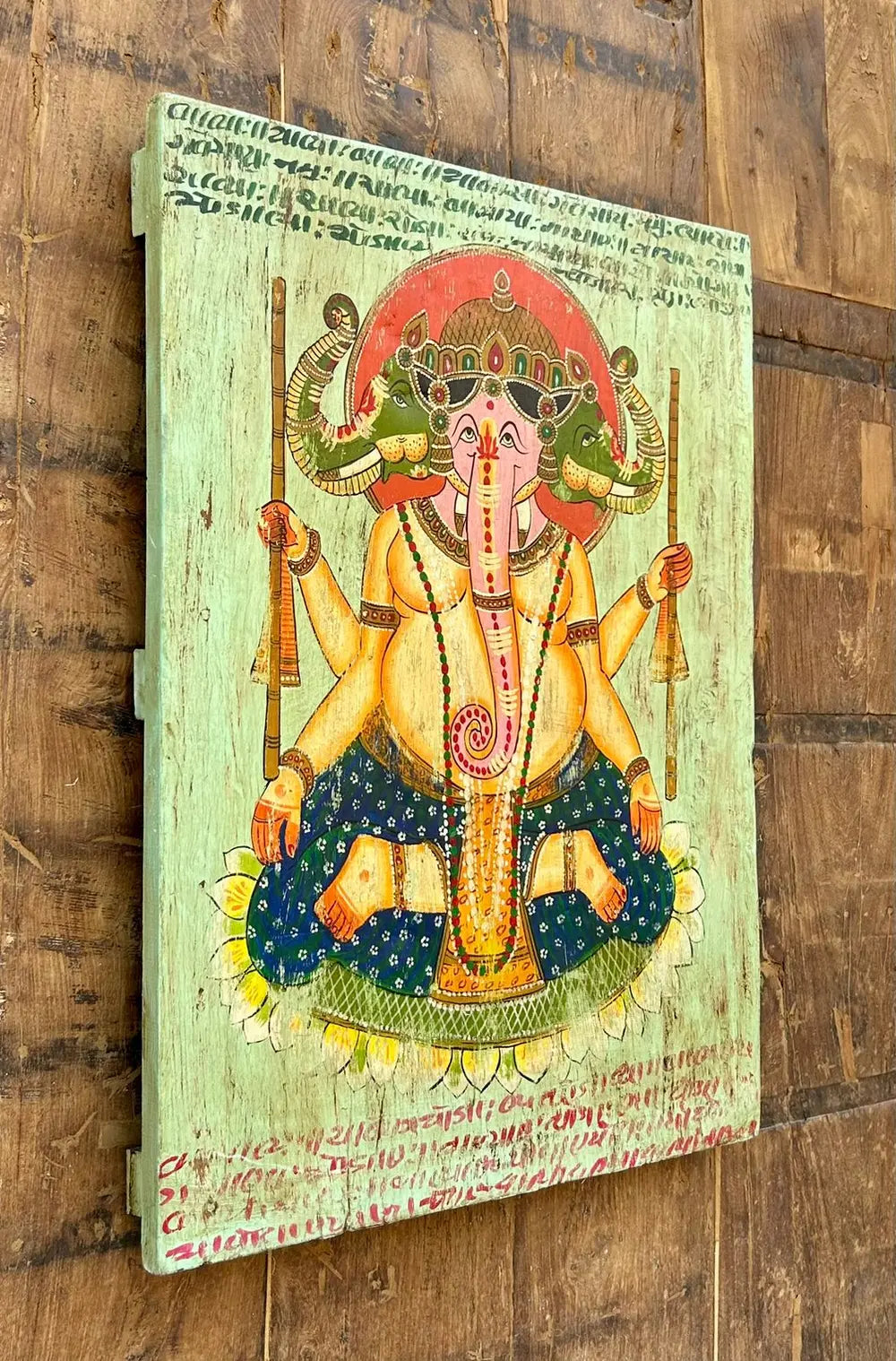 handcrafted wooden wall painting of lord ganesha – traditional vintage style