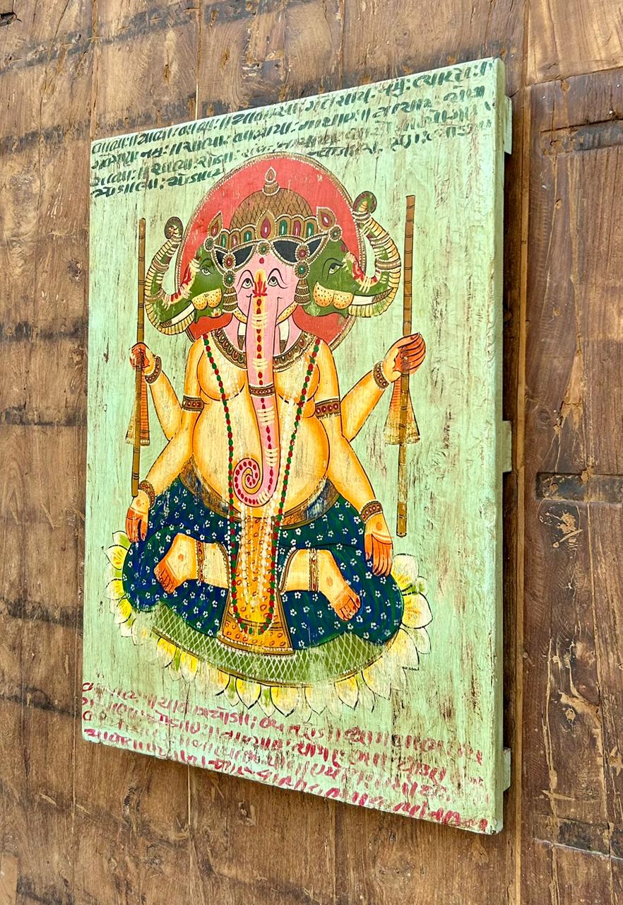 handcrafted wooden wall painting of lord ganesha – traditional vintage style