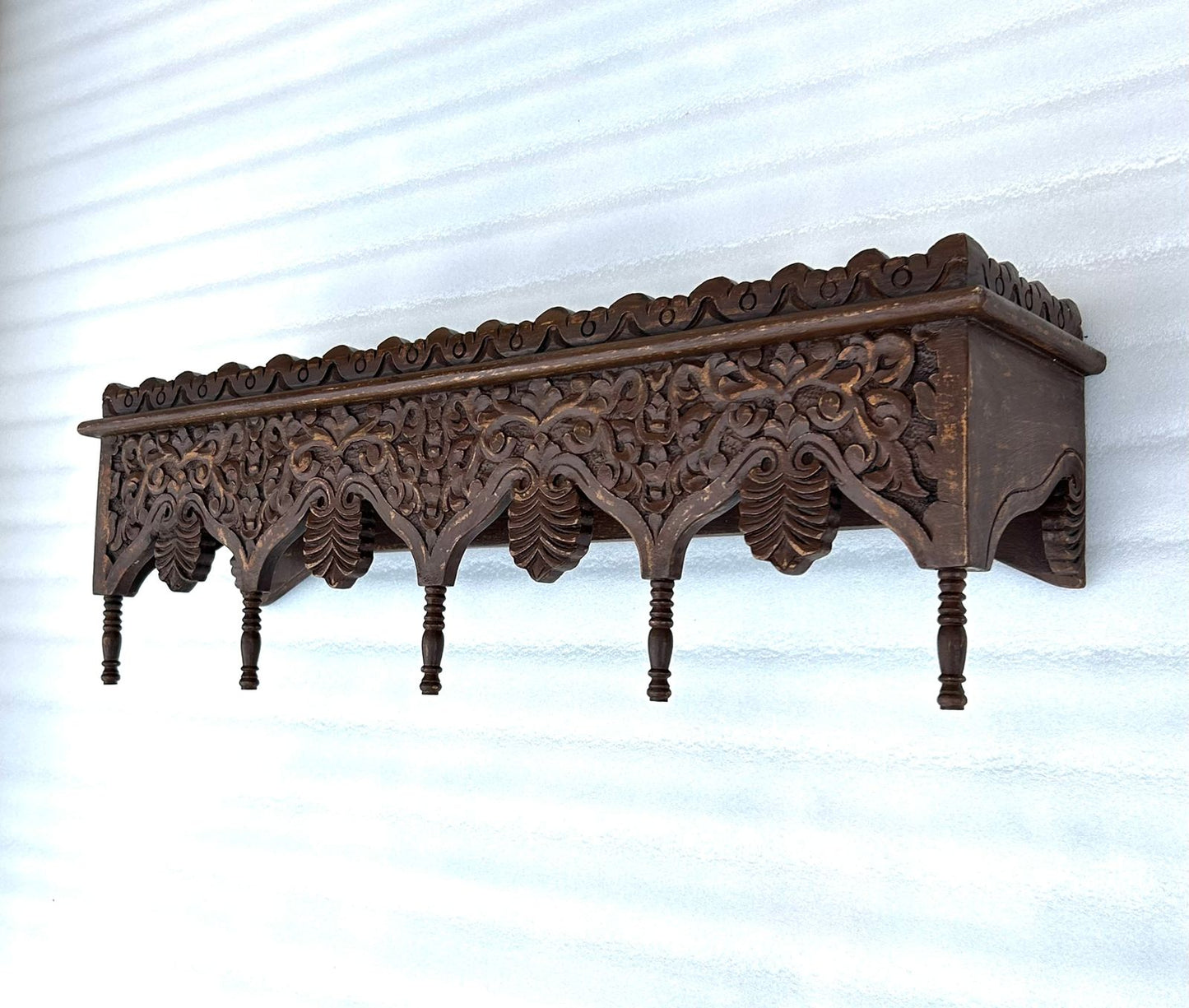 handcrafted wooden wall shelf with intricate floral carving | rustic brown wall mounted display shelf | home decor storage shelf